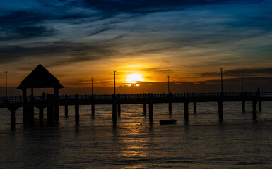 Obraz premium Sunsets, Jetties Piers and Beaches in Thailand