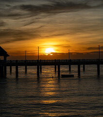 Obraz premium Sunsets, Jetties Piers and Beaches in Thailand