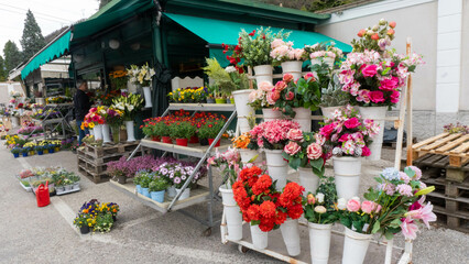 Vibrant Flower Stand at Cemetery Shop