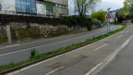 Empty City Street with Heart Graffiti