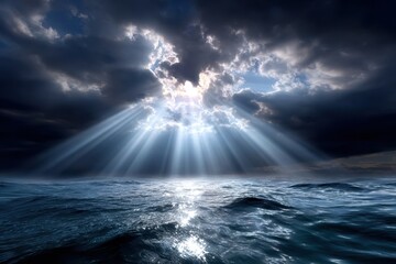 Fototapeta premium Rays of sunlight break through dark clouds over a tranquil ocean at midday