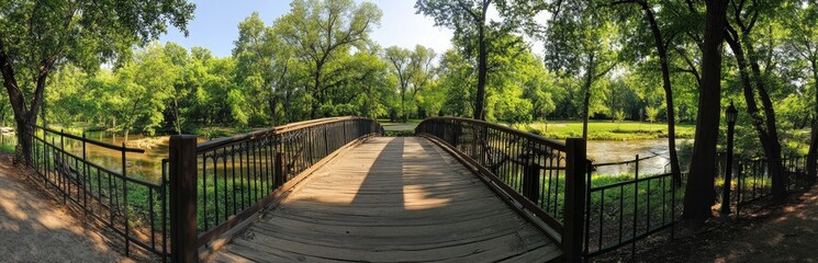 Tranquil park bridge with lush greenery