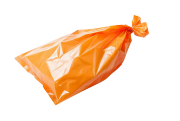 Orange plastic bag on table
