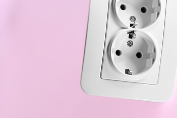 Double electrical socket for connecting devices on pink