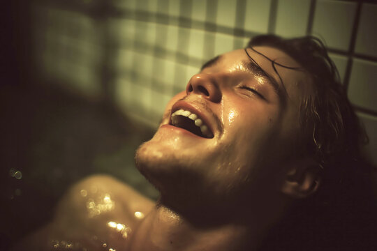 screaming adult man masturbating to orgasm on shower cabin. Concept of male sex and self-satisfaction