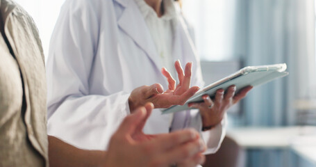 Patient, hands or doctor with tablet for consultation or health advice or explanation at clinic. Healthcare, medical worker and talking with technology or client for symptoms or diagnosis at hospital