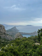 Beautiful scenery on the mountains and forest from the top of the cliff