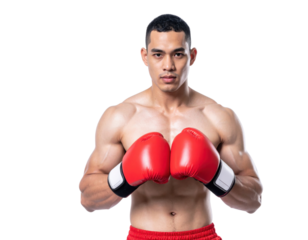 A muscular male boxer stands confidently wearing red boxing gloves and red shorts, ready for a match.