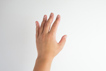 hand isolated on white background including clipping path. Female hand on white.
