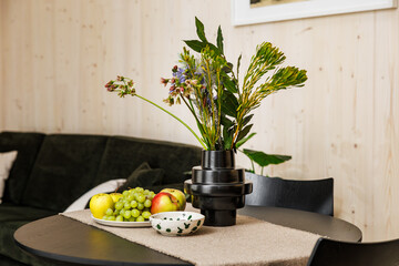 Cozy Modern Living Room with Fruit and Chocolate Arrangement