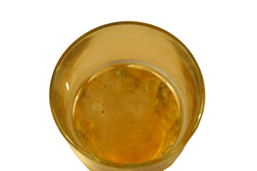 A refreshing glass of beer, filled to the brim and topped with a delicate golden foam. Light filters through the amber liquid, casting warm highlights &mdash; an invitation to savor the moment.