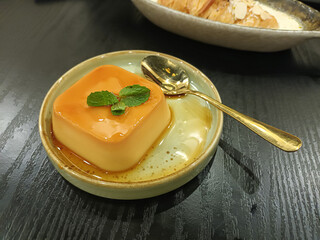 Classic Caramel Custard with Fresh Mint Garnish