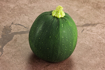 Raw green round zucchini vegetable
