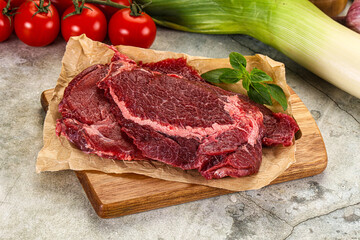 Raw beef cheeks cut for cooking