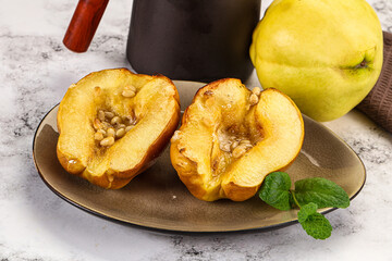 Baked quince with honey and cedar