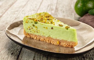 Green pistachio cheesecake served mint
