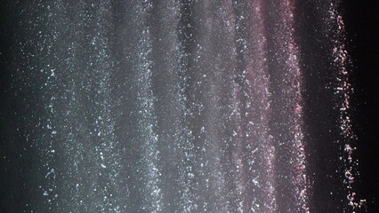 Waterfall, Night, Illumination: Close-up view showcasing illuminated cascading water at night,...