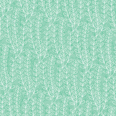 Seamless pattern with leaves on a turquoise background
