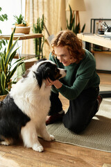 Young man enjoys cozy moments with his dog at home surrounded by plants and warmth