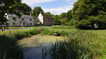 Village pond and green Barrington Cambridgeshire.
