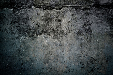 Monochrome dark grunge concrete wall texture for background design.