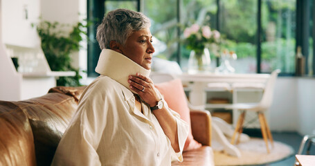 Home, injury and woman with neck brace, thinking and discomfort of fracture, pain or hurt in lounge. Accident, recovery and C collar to support spinal cord, house and healthcare for elderly person