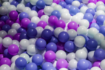 a large collection of plastic balls, commonly found in ball pits for children