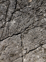 Cracked porous rocky wall