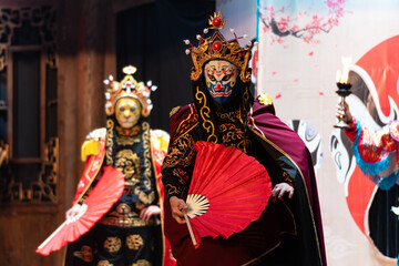 Chinese actor performs a public traditional changing face performance onstage in Chengdu, China