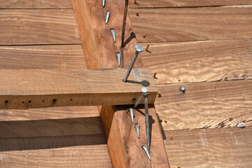 Wooden ship planks reinforced with nails