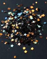 
Golden star-shaped confetti creates magical celebratory atmosphere with scattered shimmering metallic decorations.