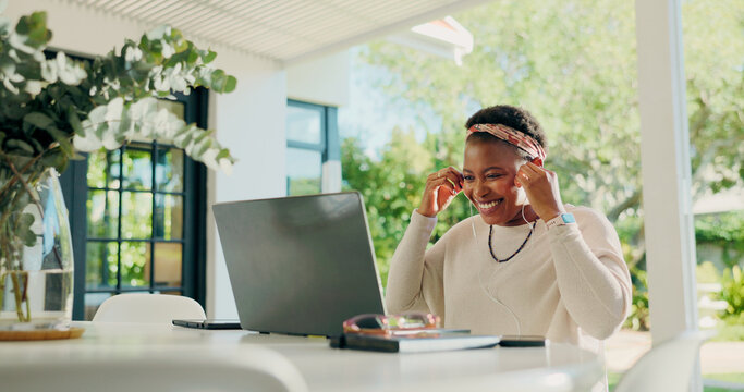 Black woman, laptop and earphones for video call with remote work from home, happy or contact on web. African person, computer and smile for virtual meeting, discussion and listen at apartment - Powered by Adobe