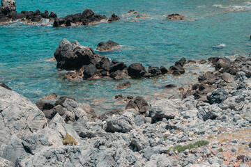 Clear turquoise water and rocky Mediterranean beach