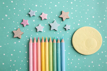 Pastel colored pencils and stars night sky scene