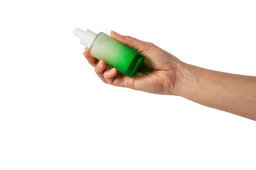 Green glass cosmetic bottle, Skin care or sunscreen cosmetic with hand on transparent background.