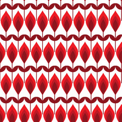 Seamless abstract vector pattern. An artistic interpretation of a flower, made in a simplified form using shades of red on a white background.