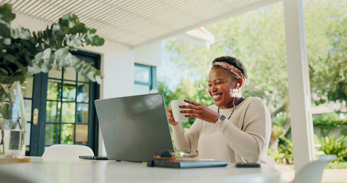 Black woman, coffee and earphones with laptop for house for remote work, video call and article chat. Person, drink and laugh with PC for virtual meeting, funny feedback and contact for publication