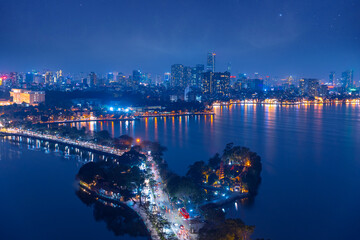 Aerial view Nighttime skyline and lake of Hanoi, Vietnam