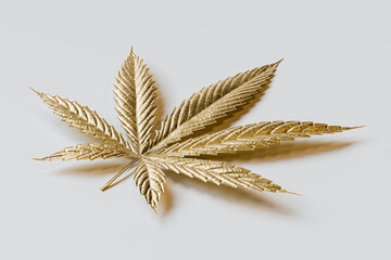 3d illustration of marijuana leaf made of gold. 3d render of golden cannabis leaf