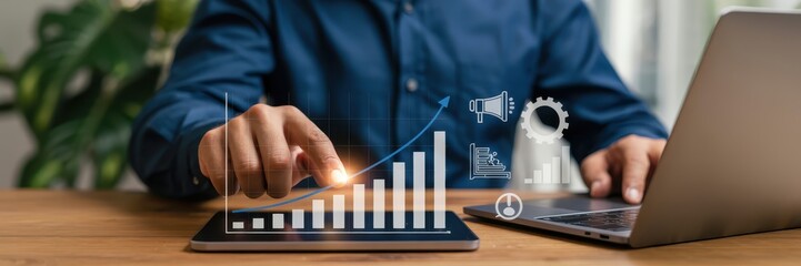 Person interacting with a digital growth chart displayed on a tablet.