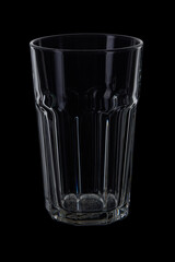 Empty tall glass on black background