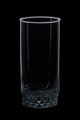 Empty tall glass on black background