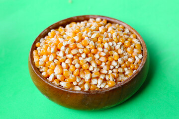 Yellow raw unpopped popcorn kernels