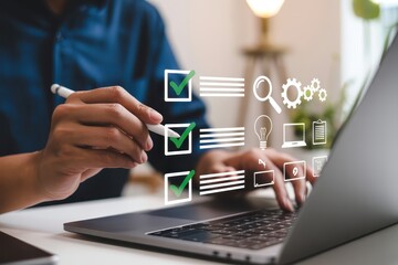 Person using a laptop with checklist and productivity icons displayed.