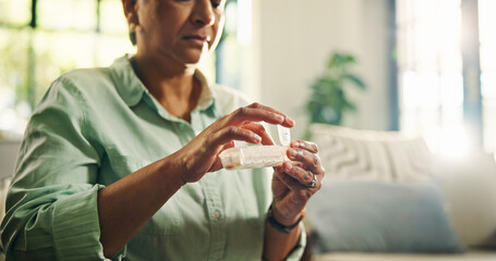 Pills, container and hands with senior woman for daily dose, healthcare and medicine at home....