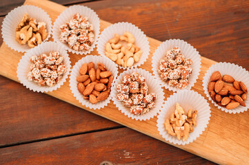 Different types of nuts in small plates