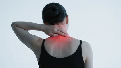 A woman in a black tank top holding her neck with a red - highlighted area indicating pain