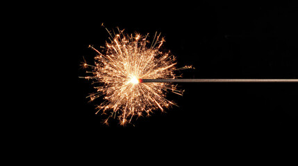 Fototapeta premium Sparkling firework ignites with vibrant light against dark background, creating festive atmosphere perfect for celebrations and special occasions