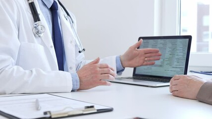 Doctor reviewing digital test results with patient, discussing health findings on laptop screen during clinical consultation. Medicine and health care concept. - Powered by Adobe