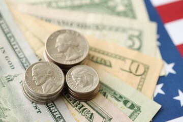 American US dollars money bills and on American flag close up